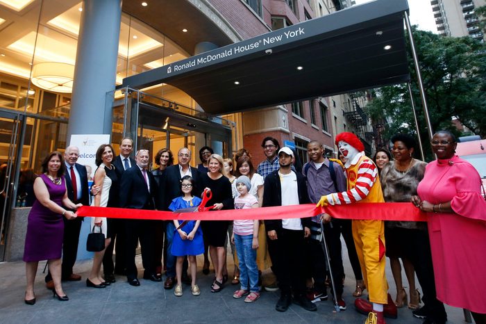 Tina Lundgren, Ruth C. Browne. Ronald McDonald House New York Chair of the Board Tina Lundgren, holding scissors, and CEO Dr. Ruth C. Browne, behind to the right, are joined by children, staff and board members of the House during the Ronald McDonald House New York Grand Re-Opening following the facility